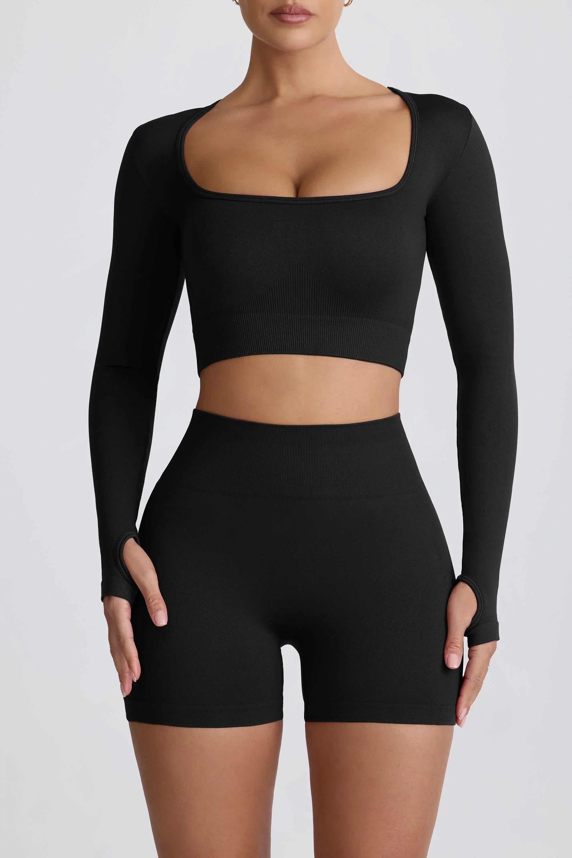 Super Sculpt Seamless Long Sleeve Crop Top in Black