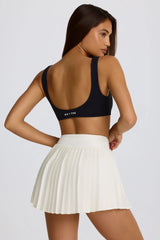 Soft Active Crossover Pleated Mini Skort in Coconut