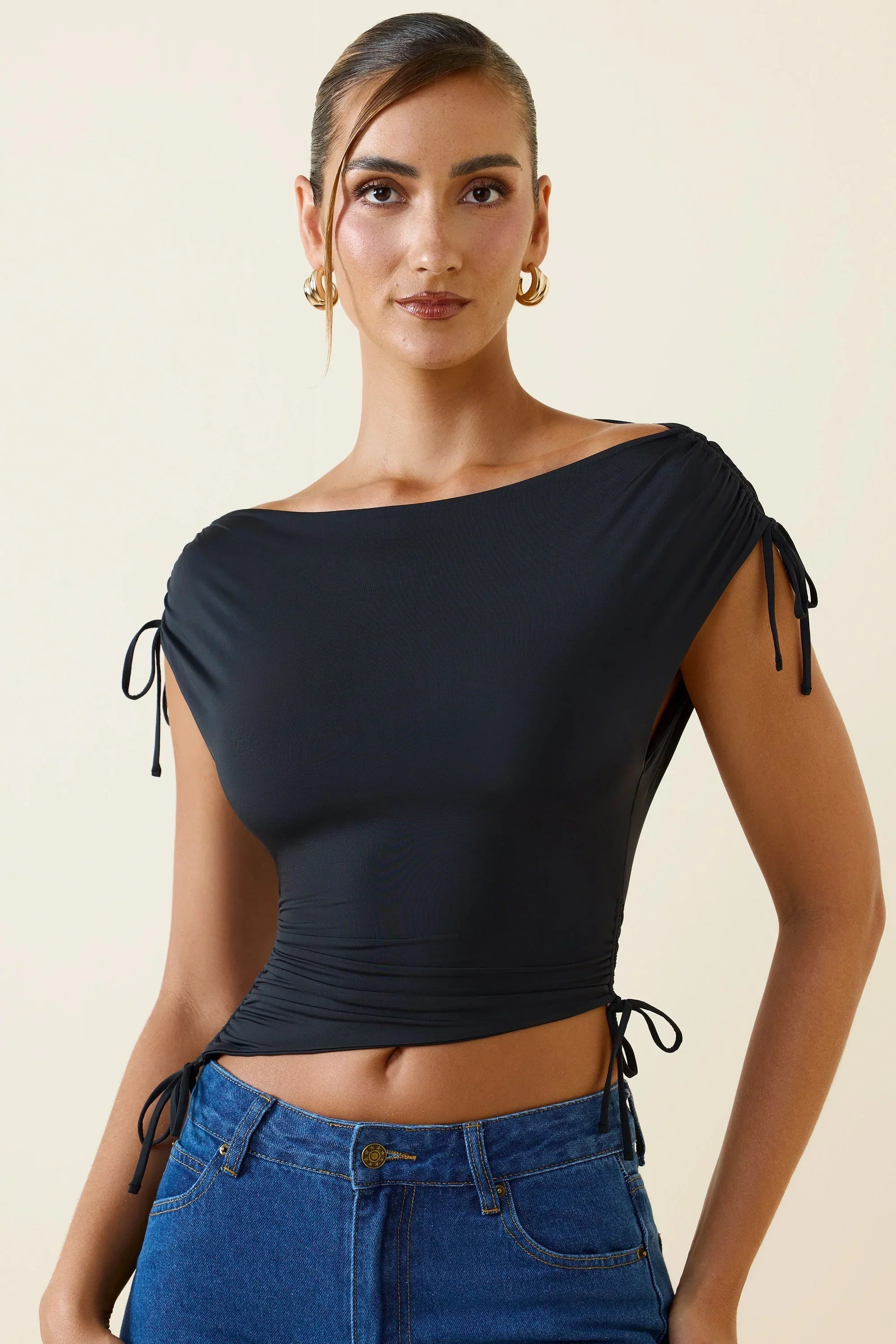 Asymmetric Ruched Cowl Back Crop Top in Black