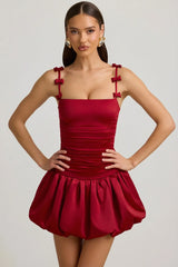 Bow Detail Ruched Bubble Hem Mini Dress in True Red